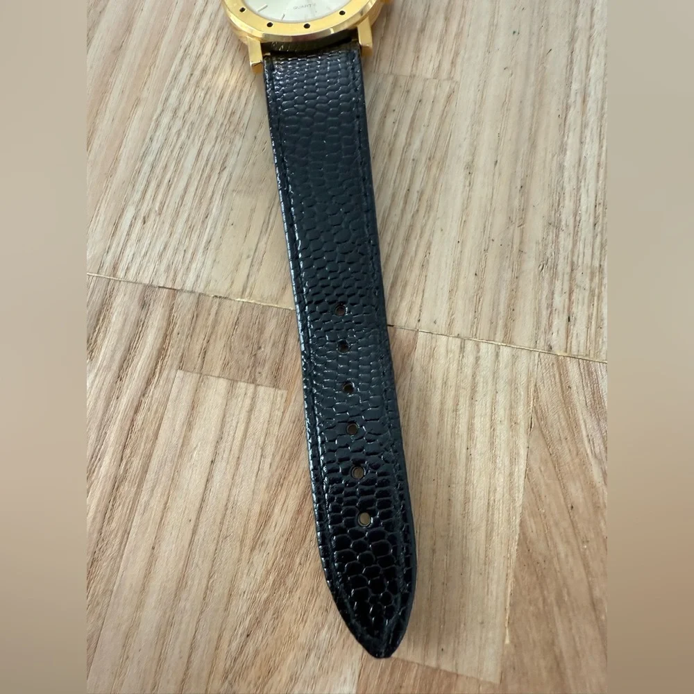 Vintage John weitz gold tone black leather watch NEW BATTERY